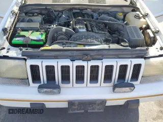 1995 Jeep Grand Cherokee Limited z VIN 1J4GZ78S0SC575083, wystawiony jako Copart lot #61047975 z przebiegiem 205 407 mil mil oraz Czysty tytuł • Clean title. Historia ofert i sprzedaży dostępna na DreamBid. Obrazek 12.
