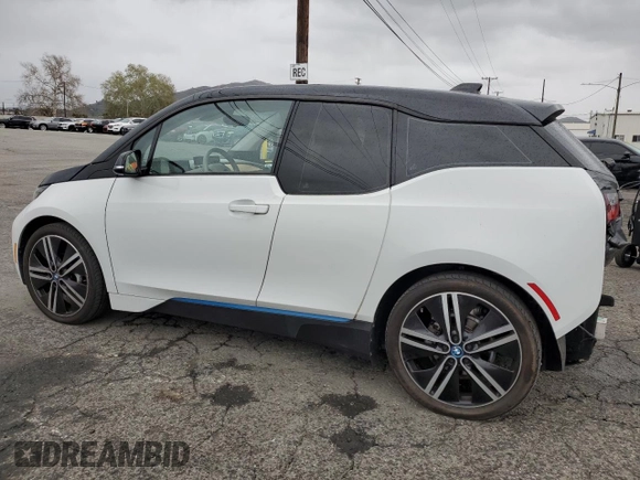 2019 BMW i3 with VIN WBY8P4C54K7D09611, listed as a Copart auction lot 48233235 with 59,853 mi miles and Salvage Title. Bid and sale history available at carsss.com. Image 2.