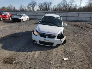 2012 Suzuki SX4 Crossover with VIN JS2YB5A32C6303887, listed as a Copart auction lot 82214144 with 0 mi miles and Salvage Title. Bid and sale history available at carsss.com. Image 10.