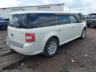 2010 Ford Flex SEL with VIN 2FMGK5CC1ABD00833, listed as a IAAI auction lot 41694538 with 143,018 mi miles. Bid and sale history available at carsss.com. Image 4.