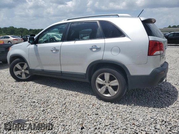 2012 Kia Sorento EX with VIN 5XYKU4A69CG288431, listed as a Copart auction lot 62986595 with 216,323 mi miles and Salvage title. Bid and sale history available at DreamBid. Image 2.