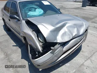 2000 Toyota Corolla VE with VIN 1NXBR12E5YZ369711, listed as a IAAI auction lot 42550174 with 273,785 mi miles and . Bid and sale history available at DreamBid. Image 6.
