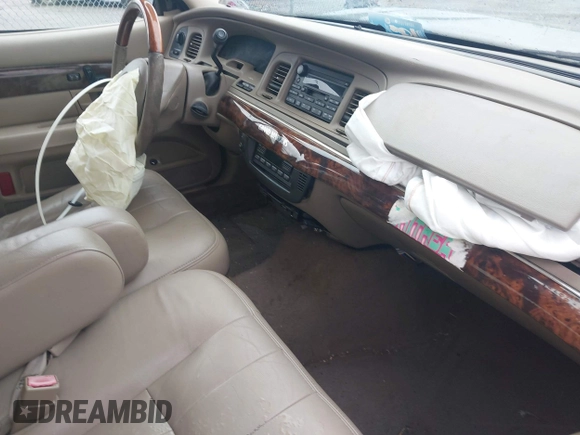2004 Mercury Grand Marquis LS Premium z VIN 2MEHM75W64X654827, wystawiony jako IAAI lot #41890046 z przebiegiem Nie podano mil oraz . Historia ofert i sprzedaży dostępna na DreamBid. Obrazek 5.