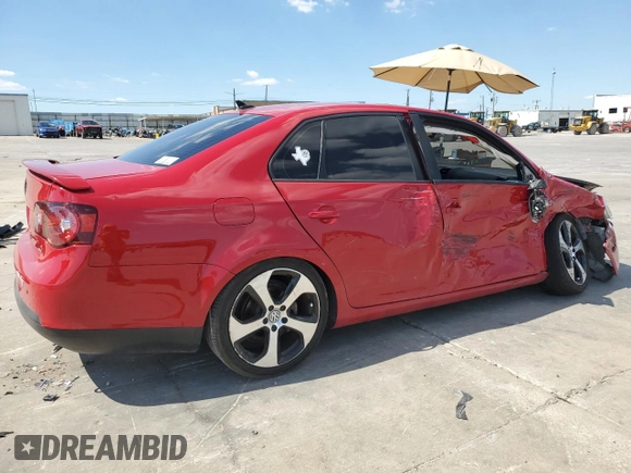 2010 Volkswagen Jetta Wolfsburg Edition with VIN 3VWRJ7AJ6AM069257, listed as a Copart auction lot 73433594 with 184,190 mi miles and Salvage title. Bid and sale history available at DreamBid. Image 3.