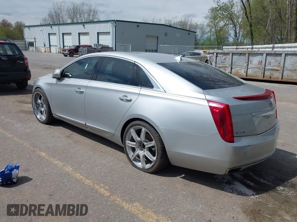 2013 Cadillac XTS Luxury z VIN 2G61P5S3XD9178601, wystawiony jako IAAI lot #42154859 z przebiegiem 111 227 mil mil oraz . Historia ofert i sprzedaży dostępna na DreamBid. Obrazek 3.