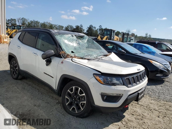 2020 Jeep Compass Trailhawk with VIN 3C4NJDDB9LT202929, listed as a Copart auction lot 74689854 with 87,343 mi miles and Salvage Title. Bid and sale history available at carsss.com. Image 4.