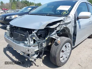 2009 Toyota Yaris with VIN JTDBT903X91300439, listed as a IAAI auction lot 42105998 with 195,880 mi miles. Bid and sale history available at carsss.com. Image 6.