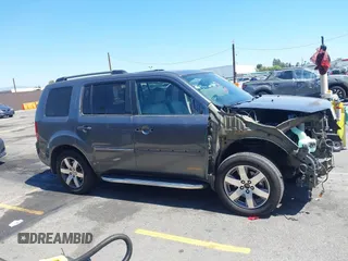 2013 Honda Pilot Touring with VIN 5FNYF3H94DB024069, listed as a IAAI auction lot 42638568 with 190,326 mi miles and . Bid and sale history available at DreamBid. Image 13.