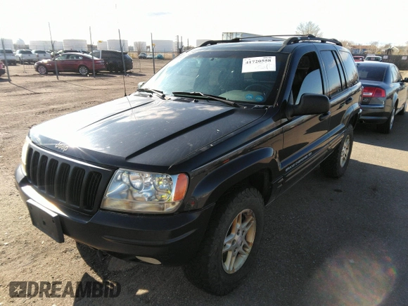 1999 Jeep Grand Cherokee Limited with VIN 1J4GW68N8XC770305, listed as a IAAI auction lot 41720558 with 206,180 mi miles. Bid and sale history available at carsss.com. Image 2.