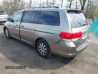 2010 Honda Odyssey EX-L with VIN 5FNRL3H68AB055744, listed as a IAAI auction lot 42107273 with 193,289 mi miles. Bid and sale history available at carsss.com. Image 3.