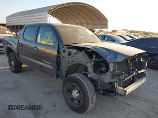 2021 Toyota Tacoma SR z VIN 3TYAX5GN2MT020997, wystawiony jako IAAI lot #40991578 z przebiegiem 81 509 mil mil oraz . Historia ofert i sprzedaży dostępna na DreamBid. Obrazek 1.