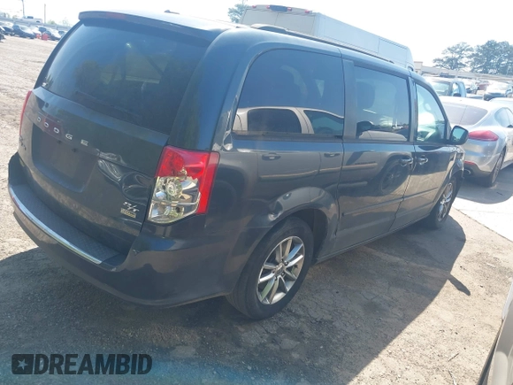 2014 Dodge Grand Caravan R/T with VIN 2C4RDGEGXER392525, listed as a IAAI auction lot 42036829 with 201,497 mi miles and . Bid and sale history available at DreamBid. Image 4.
