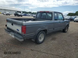 1991 Ford Ranger STX with VIN 1FTCR14X7MPA03412, listed as a Copart auction lot 63078515 with 32,891 mi miles and Salvage title. Bid and sale history available at DreamBid. Image 3.