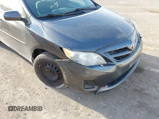2011 Toyota Corolla L with VIN 2T1BU4EE2BC692781, listed as a IAAI auction lot 41922966 with 95,523 mi miles and . Bid and sale history available at DreamBid. Image 6.