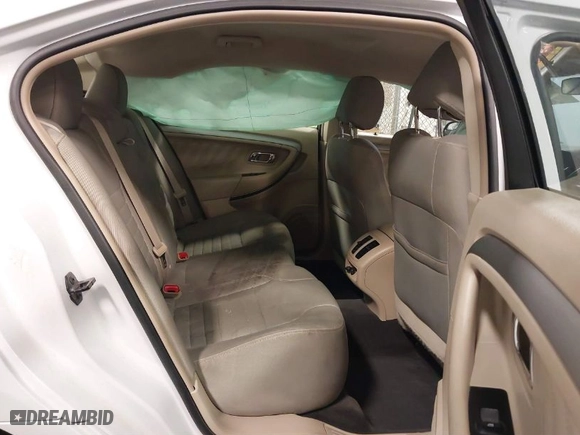 2014 Ford Taurus SE with VIN 1FAHP2D89EG178858, listed as a IAAI auction lot 40853995 with 136606 miles. Bid and sale history available at carsss.com. Image 8.