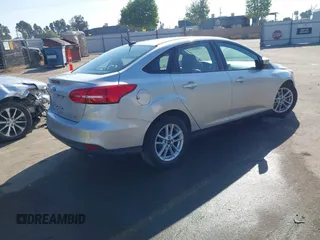 2016 Ford Focus SE with VIN 1FADP3F24GL230601, listed as a IAAI auction lot 41988130 with 176,366 mi miles. Bid and sale history available at carsss.com. Image 4.