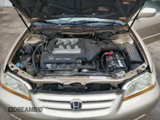 2002 Honda Accord EX z VIN 1HGCG16502A054396, wystawiony jako Copart lot #57170895 z przebiegiem 62 744 mil mil oraz Szkoda całkowita • Salvage title. Historia ofert i sprzedaży dostępna na DreamBid. Obrazek 11.