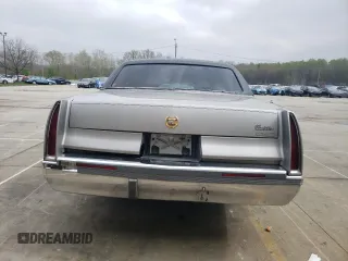 1996 Cadillac Fleetwood z VIN 1G6DW52P3TR710083, wystawiony jako Copart lot #52963025 z przebiegiem 130 658 mil mil oraz Czysty tytuł • Clean title. Historia ofert i sprzedaży dostępna na DreamBid. Obrazek 6.