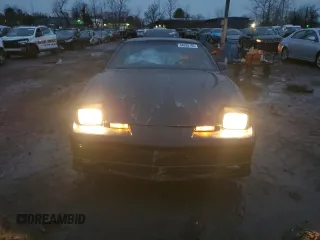 1990 Pontiac Firebird with VIN 1G2FS23TXLL205077, listed as a Copart auction lot 44035705 with 142,809 mi miles and Salvage title. Bid and sale history available at DreamBid. Image 5.