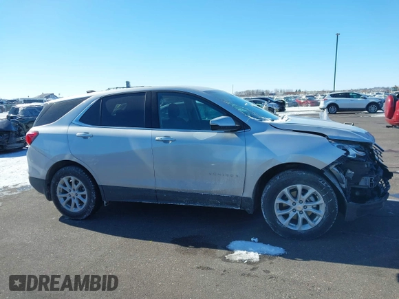 2018 Chevrolet Equinox LT z VIN 2GNAXSEV9J6350260, wystawiony jako IAAI lot #41625613 z przebiegiem 75 317 mil mil oraz . Historia ofert i sprzedaży dostępna na DreamBid. Obrazek 13.