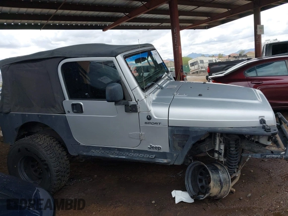 2006 Jeep Wrangler Sport with VIN 1J4FA49S46P748604, listed as a IAAI auction lot 41788157 with 128,249 mi miles. Bid and sale history available at carsss.com. Image 13.