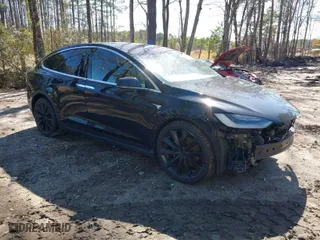 2020 Tesla Model X Long Range with VIN 5YJXCAE20LF249801, listed as a IAAI auction lot 41824645 with 118,270 mi miles. Bid and sale history available at carsss.com. Image 1.