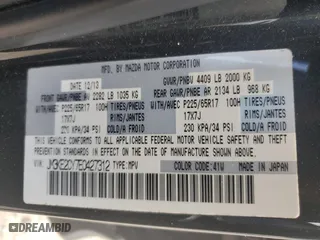 2014 Mazda CX-5 Touring with VIN JM3KE2CY7E0427312, listed as a Copart auction lot 52869335 with 192,903 mi miles and Salvage Title. Bid and sale history available at carsss.com. Image 12.