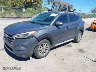 2017 Hyundai Tucson SE Plus with VIN KM8J33A45HU452928, listed as a IAAI auction lot 41601229 with 114,949 mi miles. Bid and sale history available at carsss.com. Image 17.