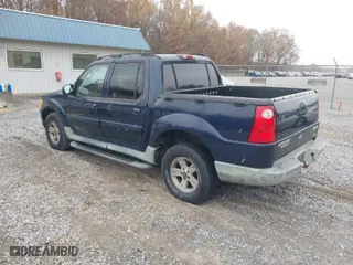 2003 Ford Explorer Sport Trac XLS with VIN 1FMZU77E33UB91041, listed as a IAAI auction lot 40965975 with 276,101 mi miles. Bid and sale history available at carsss.com. Image 3.