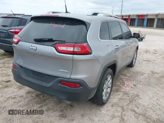 2018 Jeep Cherokee Latitude with VIN 1C4PJLCX4JD559096, listed as a IAAI auction lot 41925282 with 127,488 mi miles and . Bid and sale history available at DreamBid. Image 4.