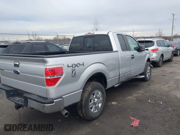 2014 Ford F-150 XL with VIN 1FTFX1ET3EFC39285, listed as a IAAI auction lot 41390024 with 217,856 mi miles. Bid and sale history available at carsss.com. Image 4.