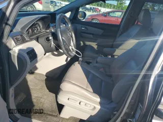 2014 Honda Odyssey Touring z VIN 5FNRL5H90EB007862, wystawiony jako Copart lot #60470005 z przebiegiem 135 686 mil mil oraz Czysty tytuł • Clean title. Historia ofert i sprzedaży dostępna na DreamBid. Obrazek 7.