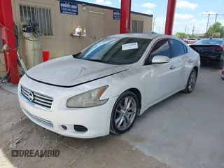 2013 Nissan Maxima SV with VIN 1N4AA5AP8DC814580, listed as a IAAI auction lot 42179159 with 122,758 mi miles and . Bid and sale history available at DreamBid. Image 2.