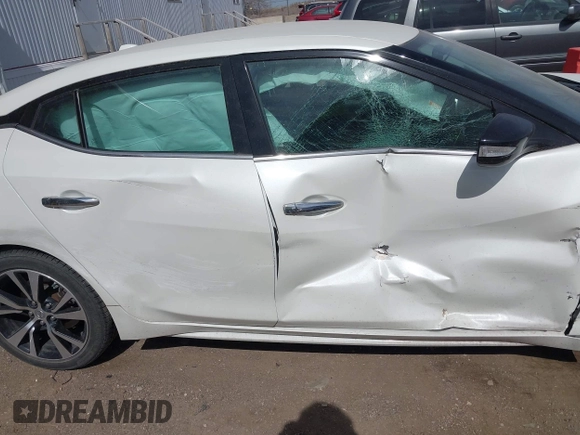 2018 Nissan Maxima SL z VIN 1N4AA6AP6JC366308, wystawiony jako IAAI lot #41823787 z przebiegiem 94 020 mil mil oraz . Historia ofert i sprzedaży dostępna na DreamBid. Obrazek 13.
