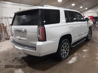 2016 GMC Yukon Denali with VIN 1GKS2CKJXGR271605, listed as a IAAI auction lot 41269124 with 172,432 mi miles. Bid and sale history available at carsss.com. Image 4.