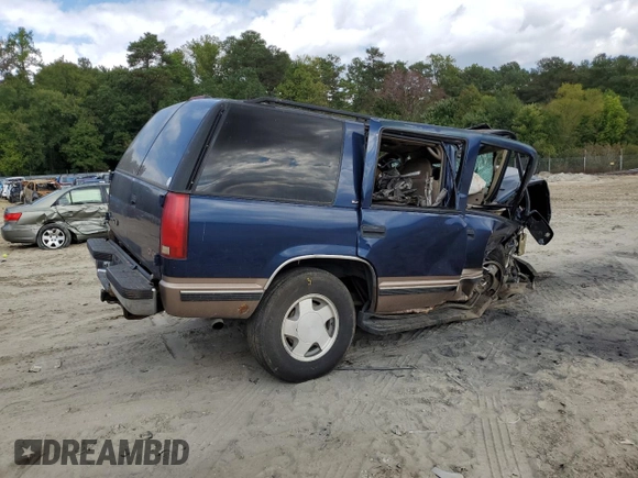 1998 GMC Yukon with VIN 1GKEK13R8WJ722890, listed as a Copart auction lot 72904114 with 243,711 mi miles and Salvage Title. Bid and sale history available at carsss.com. Image 3.