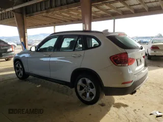 2015 BMW X1 sDrive28i with VIN WBAVM1C50FVW58031, listed as a Copart auction lot 48552735 with 205,392 mi miles and Salvage Title. Bid and sale history available at carsss.com. Image 2.