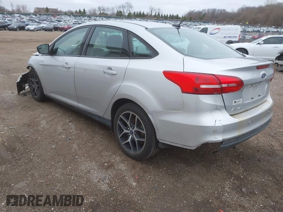 2017 Ford Focus SEL with VIN 1FADP3H20HL209209, listed as a IAAI auction lot 41921883 with 155,611 mi miles. Bid and sale history available at carsss.com. Image 3.