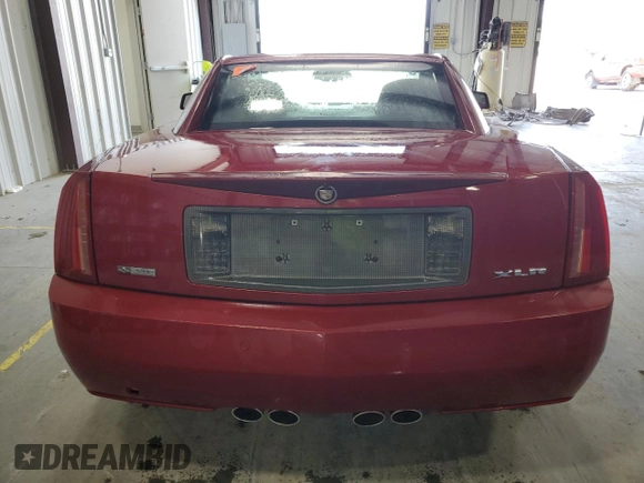 2008 Cadillac XLR z VIN 1G6YV36A985600829, wystawiony jako Copart lot #53833715 z przebiegiem 31 039 mil mil oraz Czysty tytuł • Clean title. Historia ofert i sprzedaży dostępna na DreamBid. Obrazek 6.