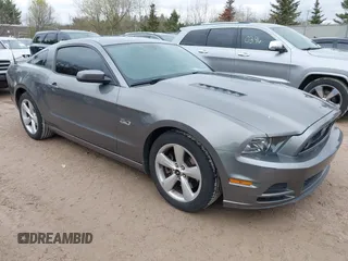 2013 Ford Mustang GT with VIN 1ZVBP8CF1D5261761, listed as a IAAI auction lot 42173607 with 76,658 mi miles and . Bid and sale history available at DreamBid. Image 1.