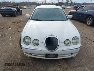 2002 Jaguar S-Type with VIN SAJDA01P12GM35163, listed as a IAAI auction lot 41097415 with 114,017 mi miles and . Bid and sale history available at DreamBid. Image 6.