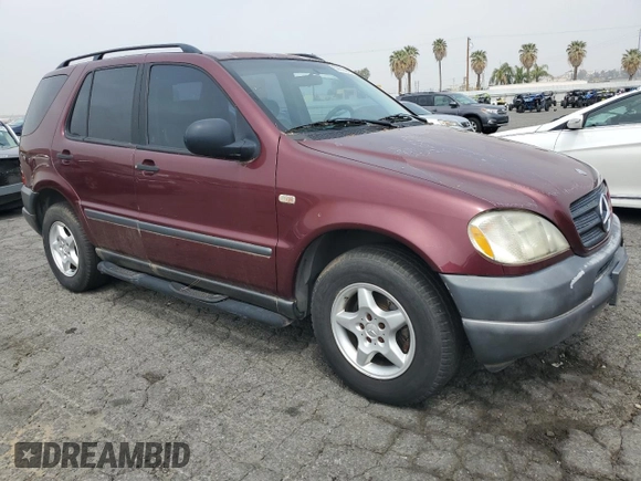 1999 Mercedes-Benz M 320/430/500 with VIN 4JGAB54E7XA099742, listed as a Copart auction lot 53672645 with 167,750 mi miles and Clean Title. Bid and sale history available at DreamBid. Image 4.