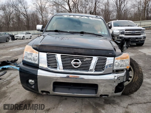 2015 Nissan Titan Pro-4X with VIN 1N6AA0EC2FN501632, listed as a Copart auction lot 84063524 with 92,342 mi miles and Salvage title. Bid and sale history available at DreamBid. Image 5.