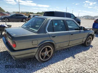 1987 BMW 3 Series 325i with VIN WBAAD2309H2446547, listed as a Copart auction lot 70882344 with 187,806 mi miles and Salvage Title. Bid and sale history available at carsss.com. Image 3.