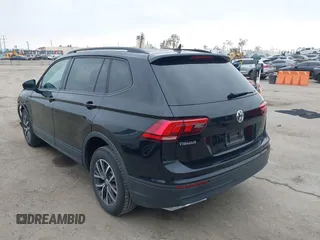 2021 Volkswagen Tiguan S with VIN 3VV1B7AX4MM025586, listed as a IAAI auction lot 41889996 with 21,777 mi miles and . Bid and sale history available at DreamBid. Image 3.
