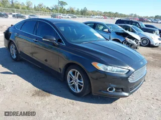 2015 Ford Fusion Titanium Hybrid with VIN 3FA6P0RUXFR119698, listed as a IAAI auction lot 41791411 with 140,646 mi miles. Bid and sale history available at carsss.com. Image 1.