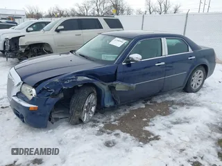 2006 Chrysler 300 C with VIN 2C3LA63H96H289693, listed as a IAAI auction lot 41308366 with 128,814 mi miles. Bid and sale history available at carsss.com. Image 18.