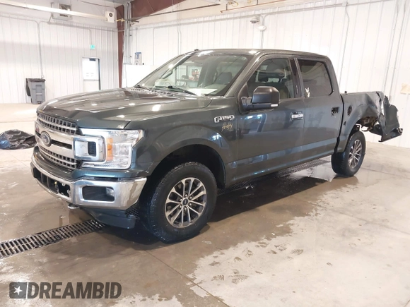 2018 Ford F-150 XL with VIN 1FTEW1EG3JKE52823, listed as a IAAI auction lot 41413009 with 142,057 mi miles. Bid and sale history available at carsss.com. Image 2.
