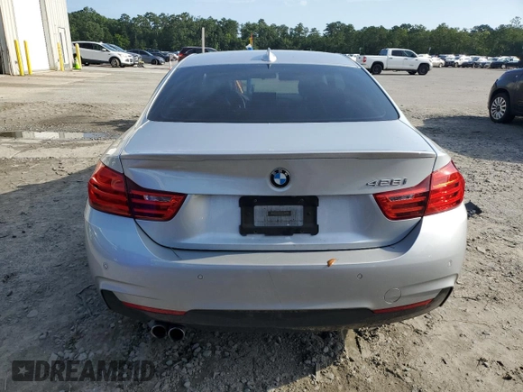 2015 BMW 4 Series 428i z VIN WBA3N3C5XFK232185, wystawiony jako Copart lot #59883035 z przebiegiem 119 548 mil mil oraz Szkoda całkowita • Salvage title. Historia ofert i sprzedaży dostępna na DreamBid. Obrazek 6.