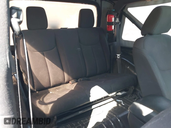 2014 Jeep Wrangler Sport with VIN 1C4AJWAGXEL319749, listed as a IAAI auction lot 41752779 with 140,045 mi miles and . Bid and sale history available at DreamBid. Image 8.